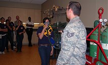 More than 300 Junior ROTC students visited the 433rd Airlift Wing, April 16, 2009. The students were mostly from Texas high schools, with one group traveling from Colorado Springs, Colo. Cadets toured several Alamo Wing work areas including, the C-5 Galaxy aircraft, the 433rd Aeromedical Evacuation Squadron, the 433rd Training Readiness Squadron and 433rd Life Support Section. (U.S. Air Force Photo/Capt. Carla Gleason)