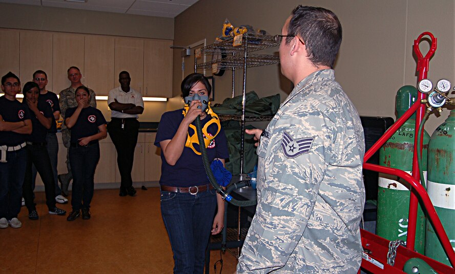More than 300 Junior ROTC students visited the 433rd Airlift Wing, April 16, 2009. The students were mostly from Texas high schools, with one group traveling from Colorado Springs, Colo. Cadets toured several Alamo Wing work areas including, the C-5 Galaxy aircraft, the 433rd Aeromedical Evacuation Squadron, the 433rd Training Readiness Squadron and 433rd Life Support Section. (U.S. Air Force Photo/Capt. Carla Gleason)