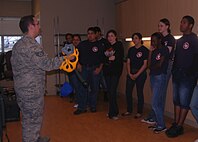 More than 300 Junior ROTC students visited the 433rd Airlift Wing, April 16, 2009. The students were mostly from Texas high schools, with one group traveling from Colorado Springs, Colo. Cadets toured several Alamo Wing work areas including, the C-5 Galaxy aircraft, the 433rd Aeromedical Evacuation Squadron, the 433rd Training Readiness Squadron and 433rd Life Support Section. (U.S. Air Force Photo/Capt. Carla Gleason)