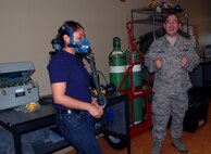 More than 300 Junior ROTC students visited the 433rd Airlift Wing, April 16, 2009. The students were mostly from Texas high schools, with one group traveling from Colorado Springs, Colo. Cadets toured several Alamo Wing work areas including, the C-5 Galaxy aircraft, the 433rd Aeromedical Evacuation Squadron, the 433rd Training Readiness Squadron and 433rd Life Support Section. (U.S. Air Force Photo/Capt. Carla Gleason)