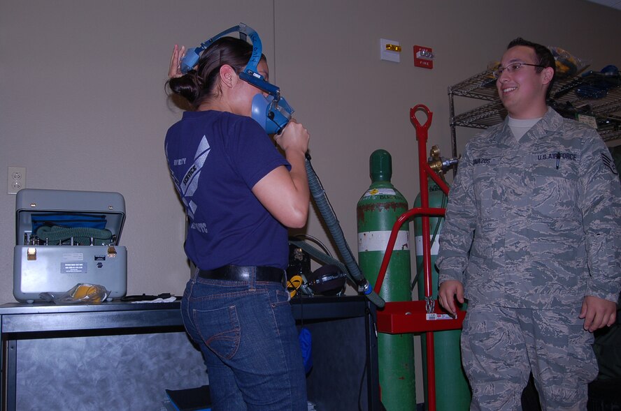 More than 300 Junior ROTC students visited the 433rd Airlift Wing, April 16, 2009. The students were mostly from Texas high schools, with one group traveling from Colorado Springs, Colo. Cadets toured several Alamo Wing work areas including, the C-5 Galaxy aircraft, the 433rd Aeromedical Evacuation Squadron, the 433rd Training Readiness Squadron and 433rd Life Support Section. (U.S. Air Force Photo/Capt. Carla Gleason)