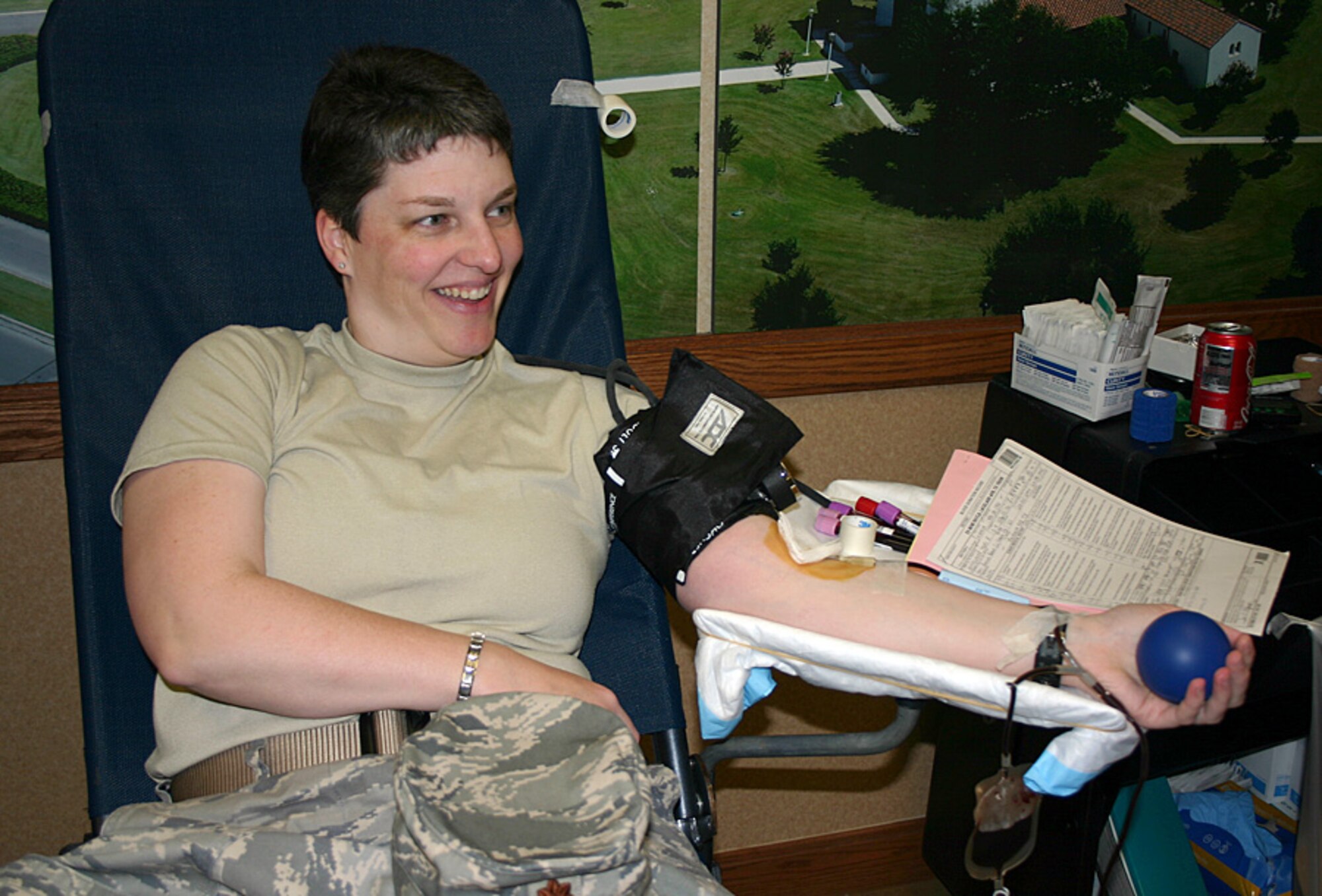 Maj. Teri Noffsinger, Air Force Personnel Center non-rated officer assignments, donates a pint of blood during an AFPC blood drive April 17 at Randolph Air Force Base, Texas. AFPC members gave more than 40 pints of blood that will be used to supply life-saving blood products to warfighters in Operation Iraqi Freedom and Operation Enduring Freedom.  (U.S. Air Force photo/Staff Sgt. Steve Grever)