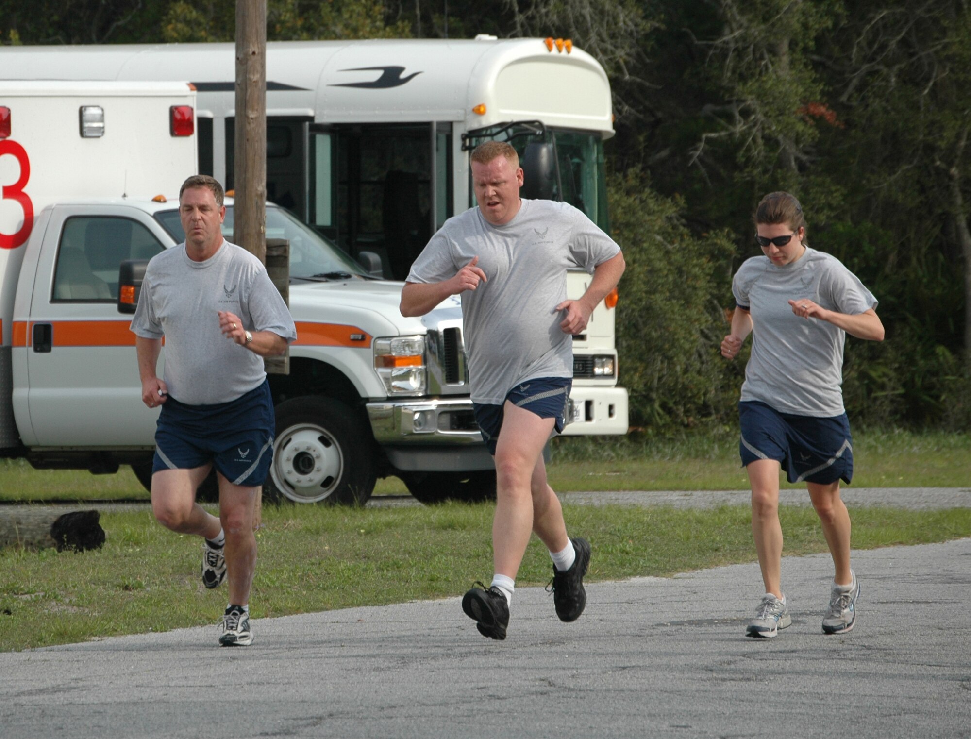 Air Force members from Tyndall Air Force Base run here April 17 in an attempt to "Beat the Boss." The purpose of the competition was to give extra incentive to score excellent during physical training testing by beating the 325th Fighter Wing commander's score of 93.5. If accomplished, those Airmen would receive a three-day pass. A total of 104 Airmen competed, and 73 of them "Beat the Boss." A perfect 100 score was acheived by 31 of these Airmen. All Airmen who beat the score were recognized by the wing commander at the base's "Spring Fling" event in Heritage Park. (U.S. Air Force photo/Airman 1st Class Veronica McMahon)