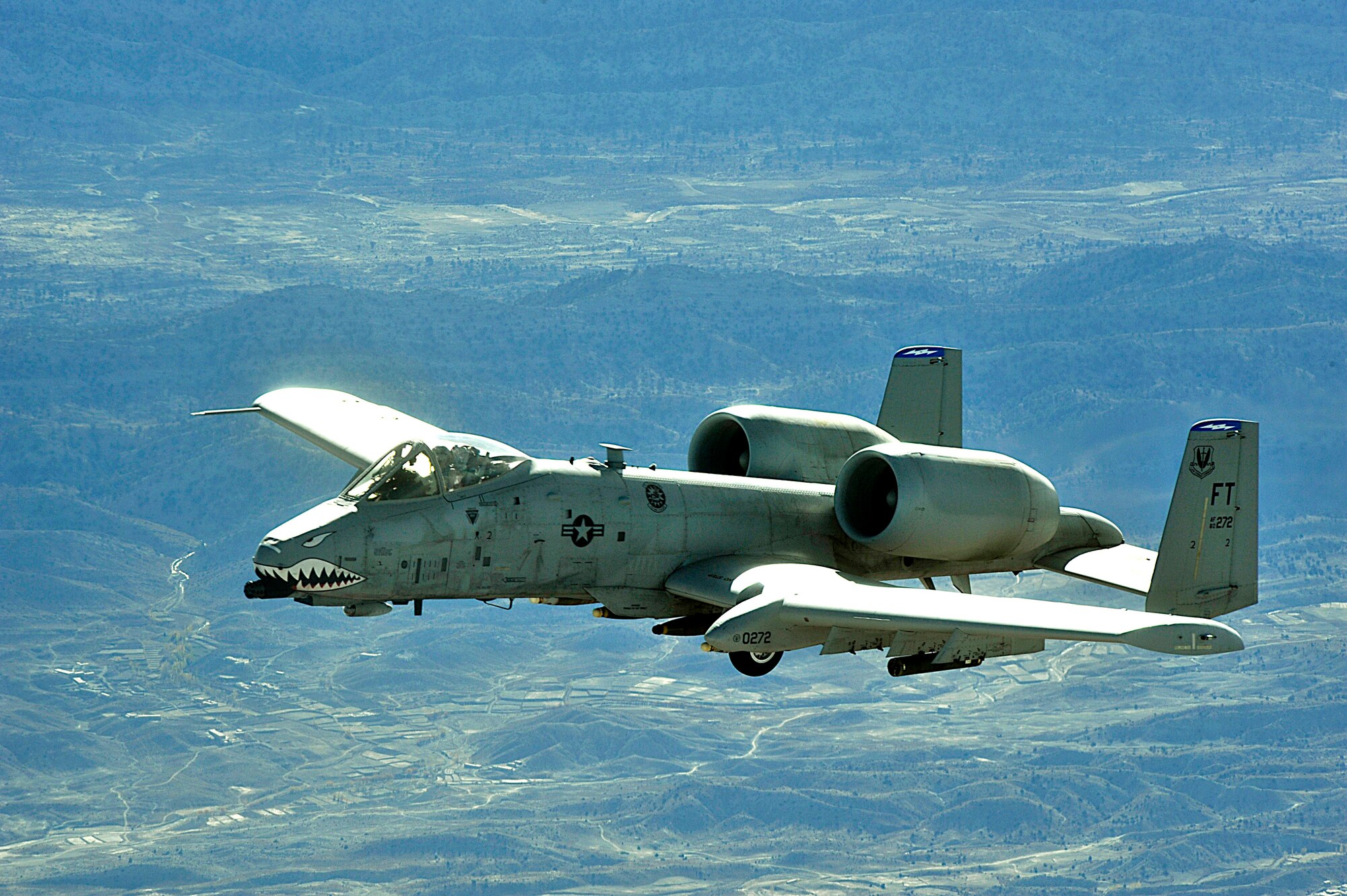 An A-10 Thunderbolt II flies a combat mission over Afghanistan. A-10s provide close-air support and employ a wide variety of conventional munitions, including general purpose bombs, cluster bombs units and laser guided bombs. (U.S. Air Force photo/Staff Sgt. Aaron Allmon)  