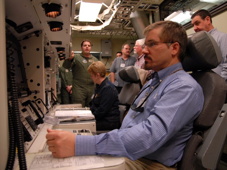 Rick Stevens, Pierce Military Business Alliance board member, monitors a Minuteman III ICBM launch control trainer console during a briefing at Malmstrom AFB, Mont., April 8. Mr. Stevens and 23 other civic leaders attended a fly-away community relations tour April 7 and 8 to develop advocates of airpower throughout the region. The group visited McChord, Fairchild and Malmstrom Air Force Bases. (U.S. Air Force photo by Beau Wade)