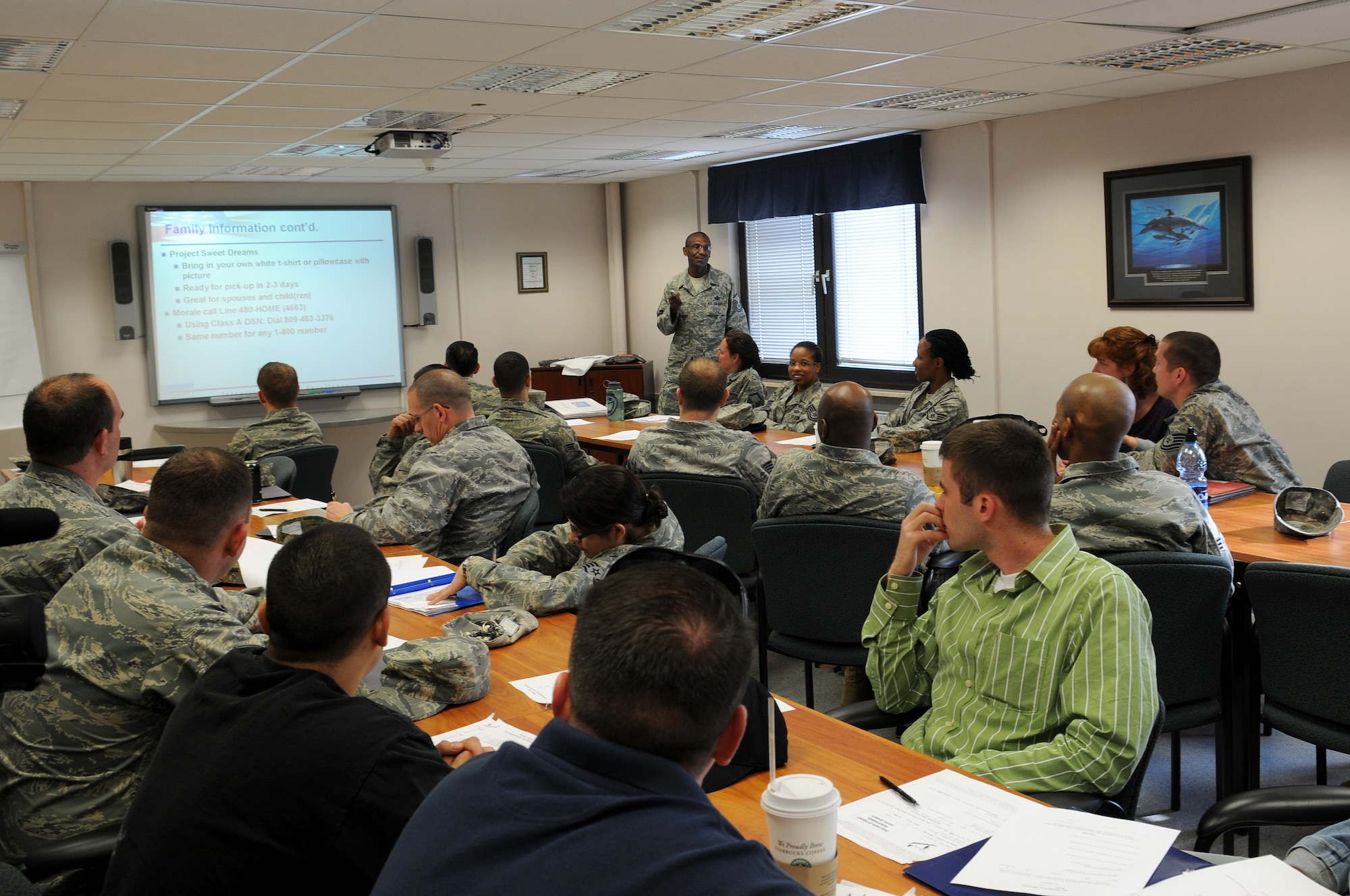 Airmen and families attend the pre-deployment briefing at the Airmen and Family Readiness Center, Ramstein Air Base, April 14. The AFRC is a one stop information center that is available for single, married, active duty servicemembers,
retired individuals and the families within the KMC.
(U.S. Air Force photo by Airman 1st Class Grovert Fuentes-Contreras)