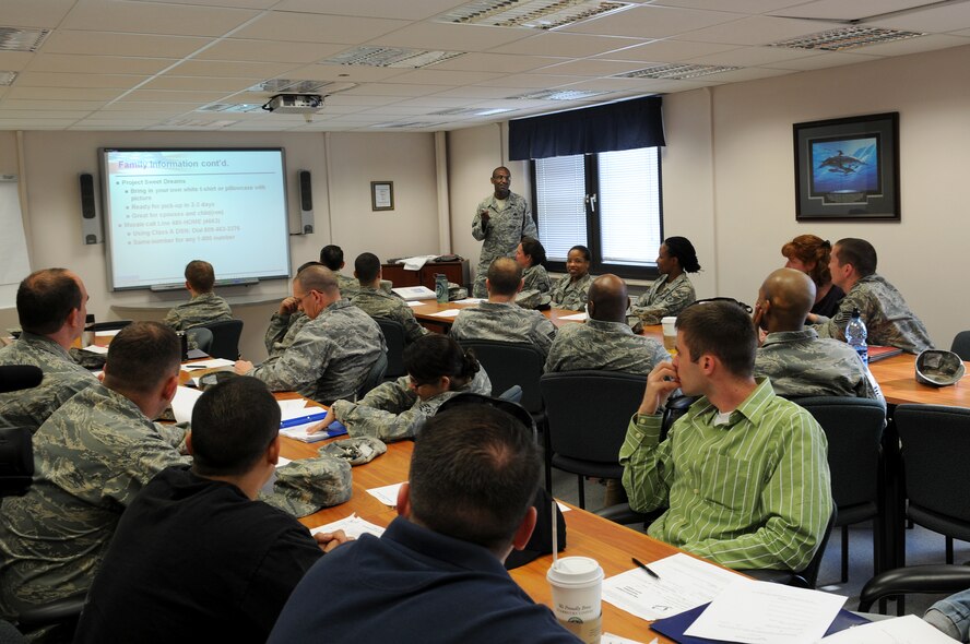 Airmen and families attend the pre-deployment briefing at the Airmen and Family Readiness Center, Ramstein Air Base, April 14. The AFRC is a one stop information center that is available for single, married, active duty servicemembers,
retired individuals and the families within the KMC.
(U.S. Air Force photo by Airman 1st Class Grovert Fuentes-Contreras)