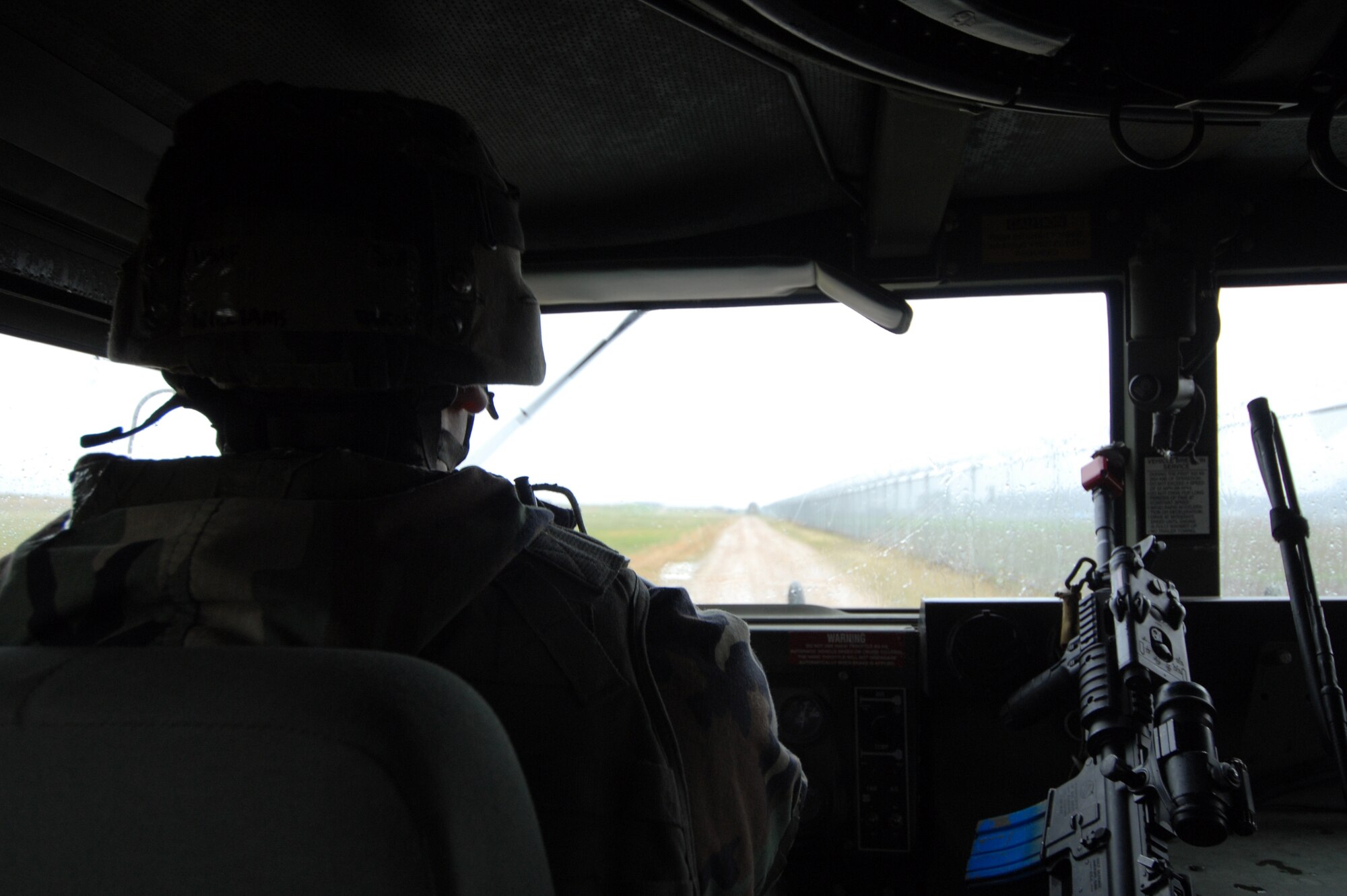 Senior Airman Daron Williams, 8th Security Forces Squadron, patrols the base during the Operational Readiness Inspection at Kunsan Air Base, Republic of Korea, April 20, 2009. Security forces defenders play a major role in completing the wing mission and will be evaulated alongside other Kunsan members by the more than 100 Pacific Air Forces Inspector General evaluators on station for the inpsection. (U.S. Air Force Photo/Senior Airman Gustavo Gonzalez)