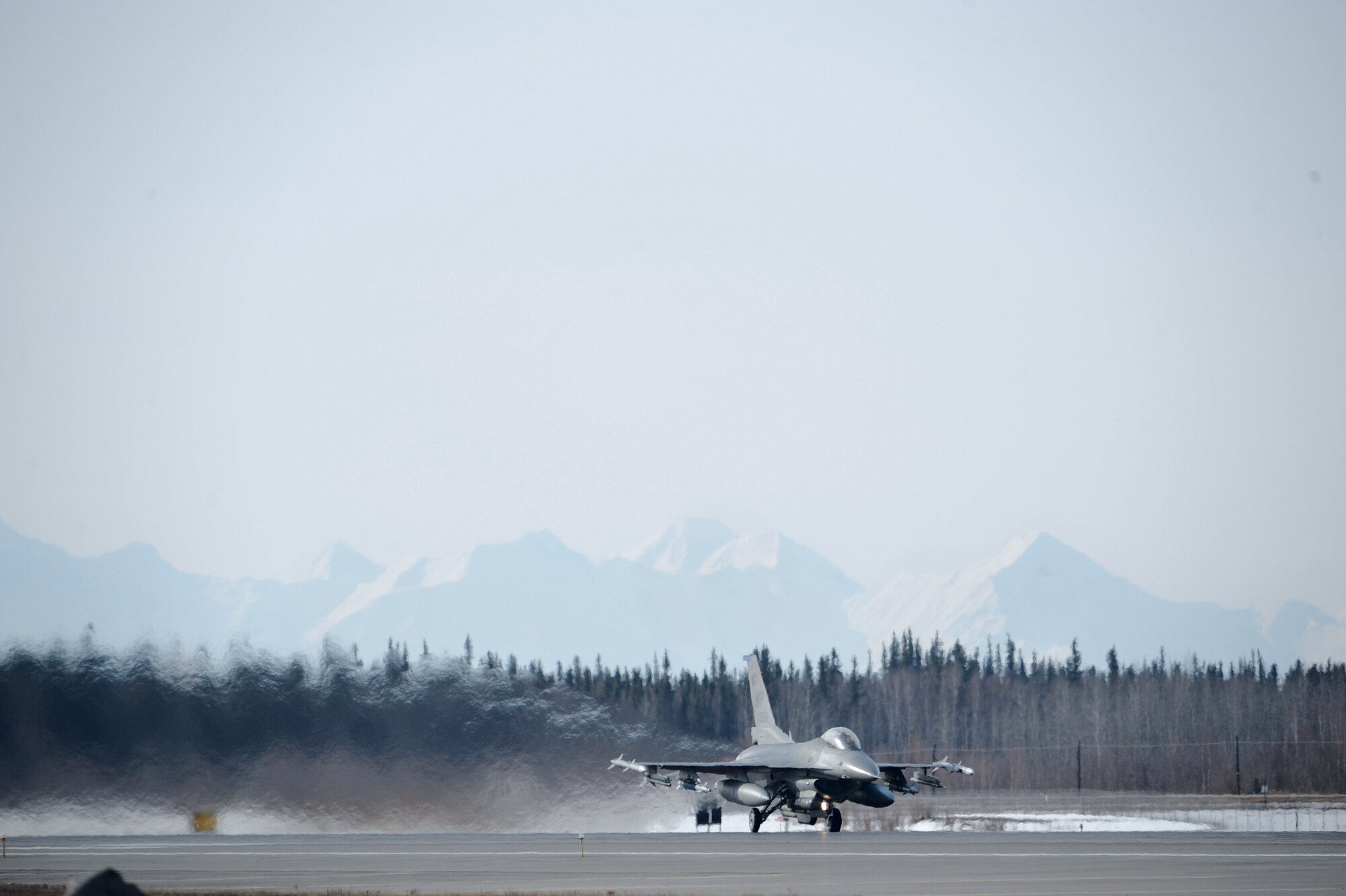 An F-16 Fighting Falcon, 35th Fighter Squadron, Kunsan Air Base, Korea, prepares to take off during RED FLAG-Alaska 09-2 April 21, 2009, Eielson Air Force Base, Alaska. RF-A is a series of Pacific Air Forces commander-directed field training exercises for U.S. forces, providing joint offensive counter-air, interdiction, close air support, and large force employment training in a simulated combat environment.  (U.S. Air Force Photo/Senior Airman Jonathan Snyder)