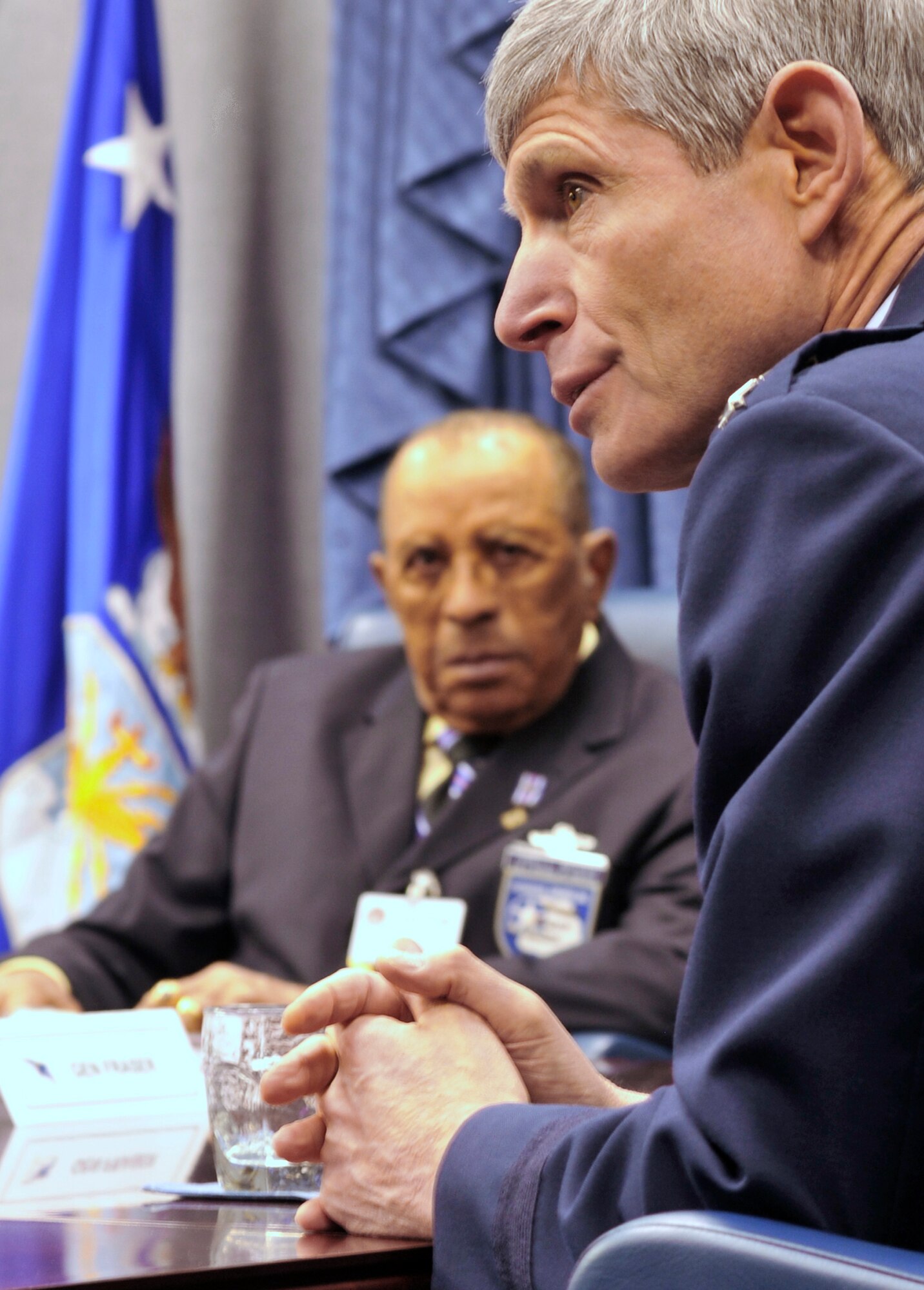 Air Force Chief of Staff Gen. Norton Schwartz (right) talks with Tuskegee Airmen including James C. Warren in the Pentagon April 20.  Four Tuskegee Airmen and retired Lt. Gen. Russell Davis were in Washington to meet with General Schwartz and Air Force Vice Chief of Staff Gen. William Fraser III prior to departing on a tour of units in Southwest Asia including the 332nd Air Expeditionary Wing whose origins trace back to the 332nd Fighter Group and the Tuskegee Red Tail Flyers.  (U.S. Air Force photo/Scott M. Ash)