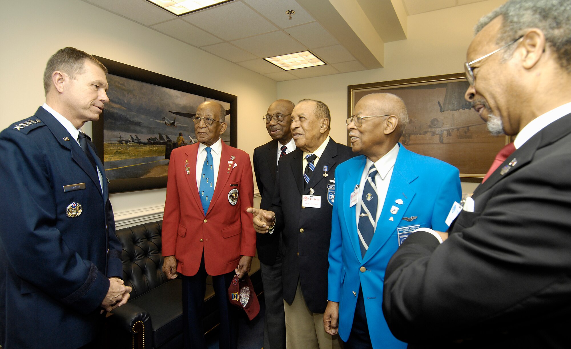 Air Force Vice Chief of Staff Gen. William Fraser III greets Tuskegee Airmen Phillip Wheeler Broome (from left), George Mills Boyd, James C. Warren and Alexander Jefferson, along with their host, retired Lt. Gen. Russell Davis, in the Pentagon April 20.  The Airmen and Gen. Davis were in Washington to meet with General Fraser and Air Force Chief of Staff Gen. Norton Schwartz prior to departing on a tour of units in Southwest Asia including the 332nd Air Expeditionary Wing whose origins trace back to the 332nd Fighter Group and the Tuskegee Red Tail Flyers.  (U.S. Air Force photo/Scott M. Ash)