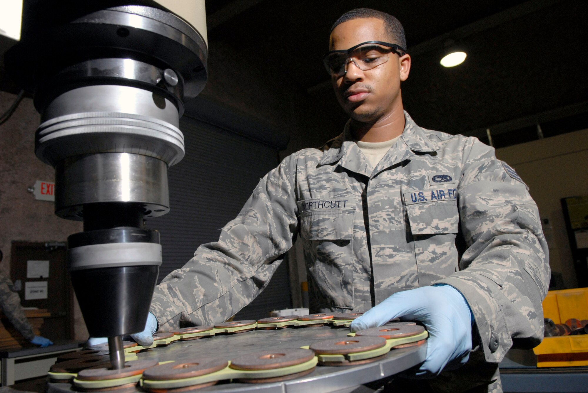 Senior Airman Joseph Northcutt assembles the lining for a KC-135 Stratotanker steel brake assembly April 17 at an air base in Southwest Asia. Airman Northcutt is a hydraulics journeyman with the 379th Expeditionary Maintenance Squadron, and is from Los Angeles.  (U.S. Air Force photo/Senior Airman Andrew Satran)