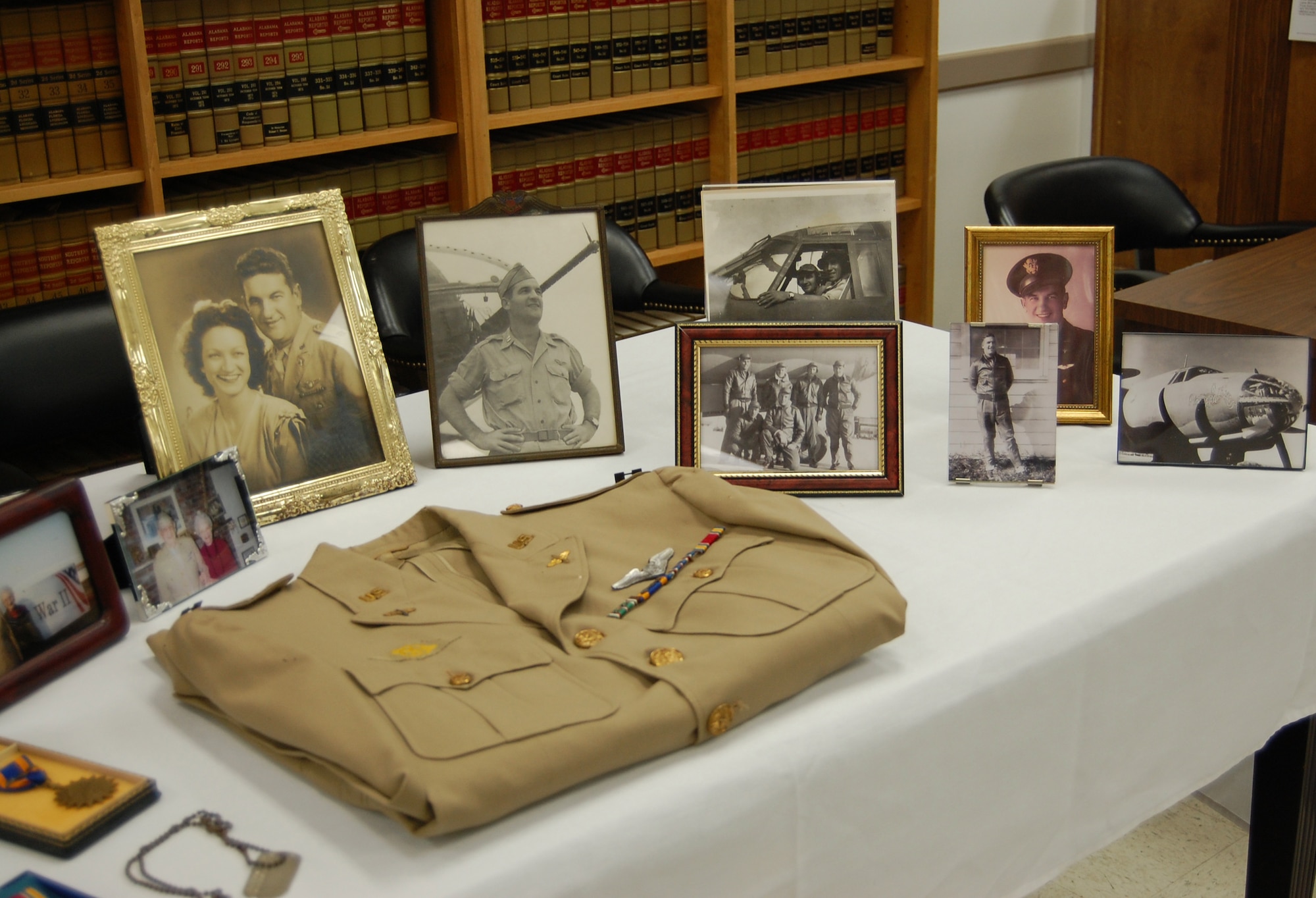 World War II memories of Capt. William Norred were on display during a ceremony April 13 in Greenville, Ala., where his widow was presented the Distinguished Flying Cross he earned in a wartime B-26 Marauder mission in Africa. (U.S. Air Force photo/Carl Bergquist) 