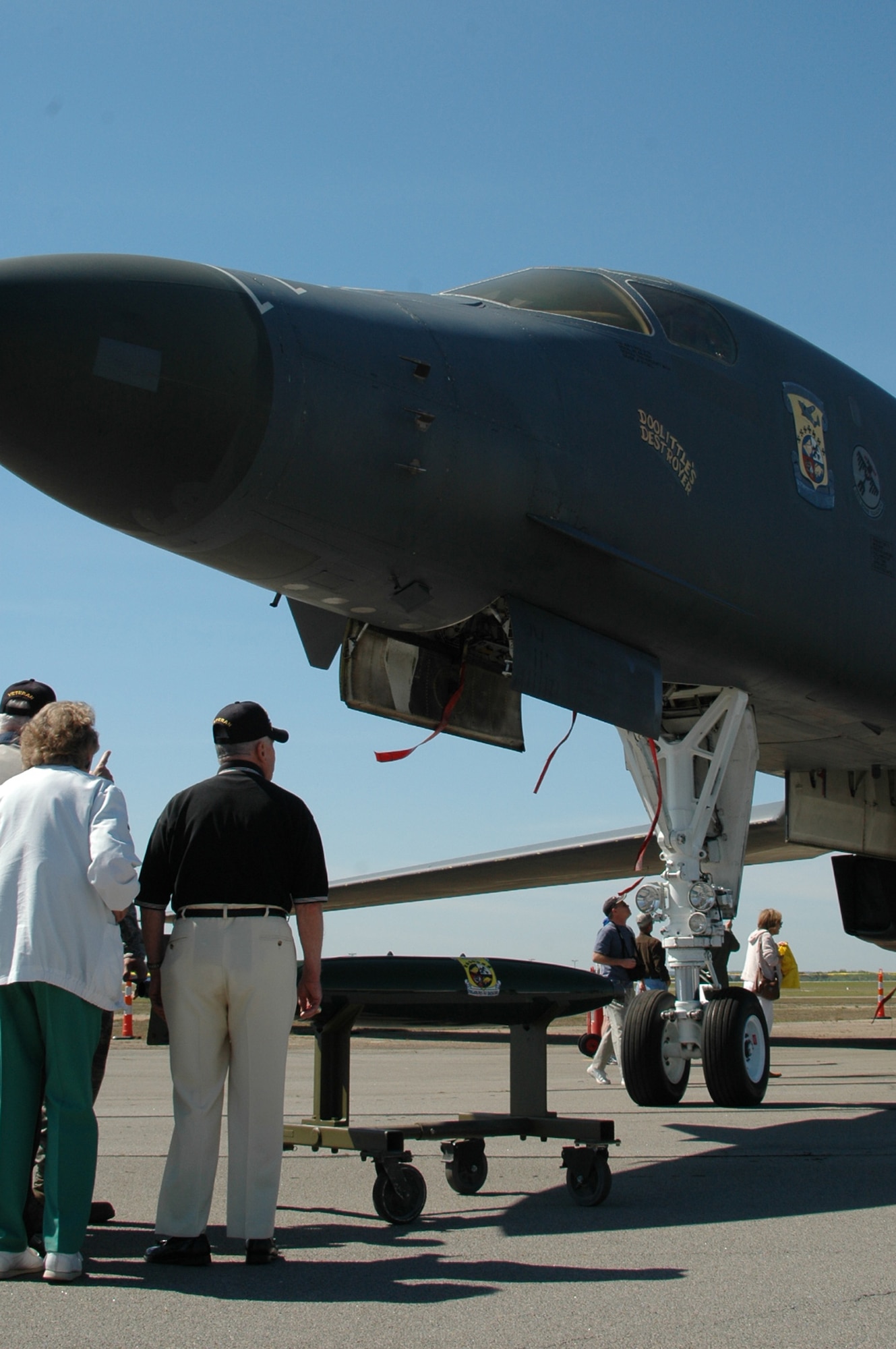 Visitors look at a B-1B Lancer displayed in honor of five of the nine surviving Doolittle Raiders during the 67th Raider Reunion in Columbia, S.C., April 17. On April 18, 1942, the Doolittle Raiders, led by then-Lt. Col. Jimmy Doolittle, became the first to bombard Japan following the attack on Pearl Harbor. (U.S. Air Force photo/Capt. Kaylene Giri)