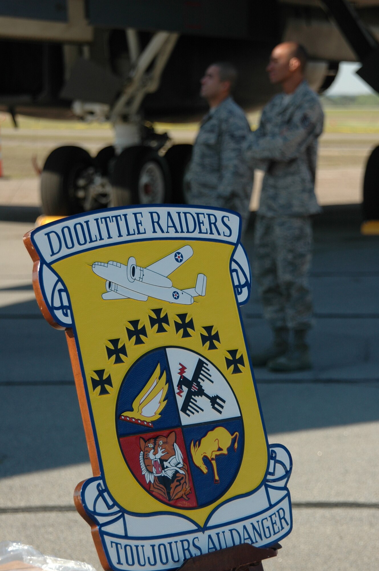 Airmen look at a B-1B Lancer displayed in honor of five of the nine surviving Doolittle Raiders during the 67th Raider Reunion in Columbia, S.C., April 17. On April 18, 1942, the Doolittle Raiders, led by then-Lt. Col. Jimmy Doolittle, became the first to bombard Japan following the attack on Pearl Harbor. (U.S. Air Force photo/Capt. Kaylene Giri)