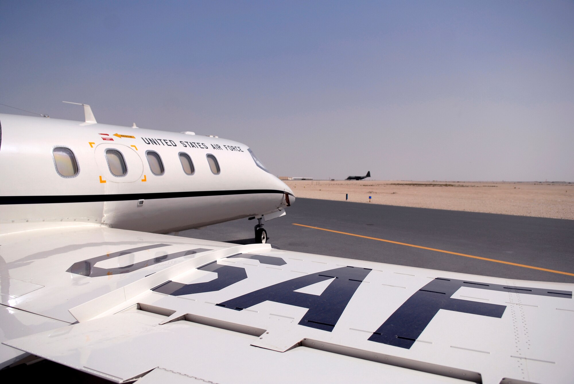 A view over the wing of a USAF C-21 aircraft, Apr. 15, 2009, at an undisclosed location in Southwest Asia.  The C-21 is an operational support airlift aircraft for transporting personnel and provides emergency medical evacuation transport if needed within the U.S. Central Command's Area of Responsibility.  The C-21 is utilized in support of Operations Iraqi and Enduring Freedom and Combined Joint Task Force - Horn of Africa.  (U.S. Air Force photo/Senior Airman Andrew Satran/released)