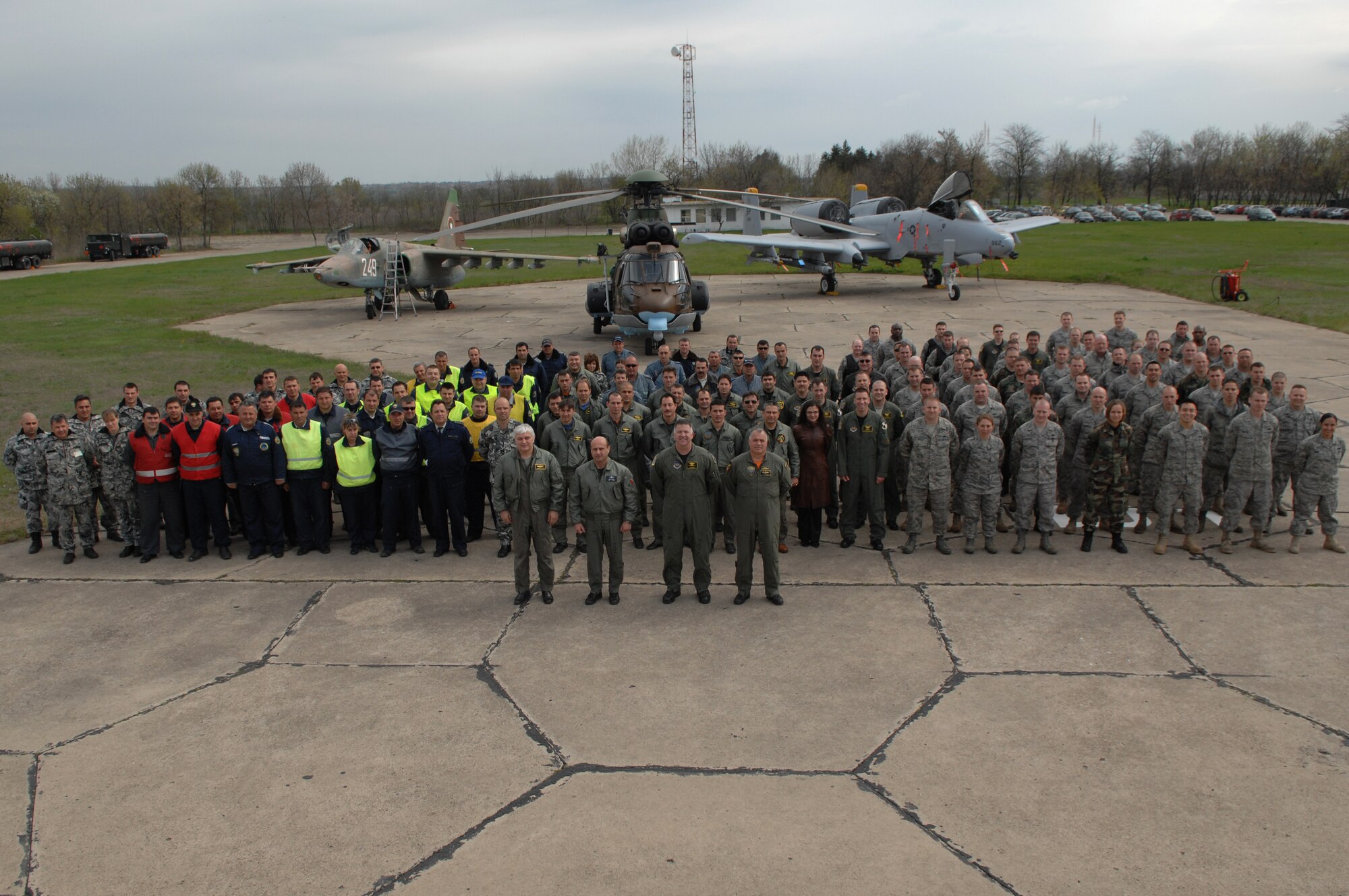 BEZMER AIR BASE, Bulgaria – U.S. and Bulgarian Airmen pose for a photo in front of their aircraft April 15, 2009. Airmen deployed from Spangdahlem and Ramstein Air Bases, Germany, to Bezmer Air Base, Bulgaria, to support “Reunion April 2009,” a joint training exercise. (U.S. Air Force photo by Master Sgt. Bill Gomez) 