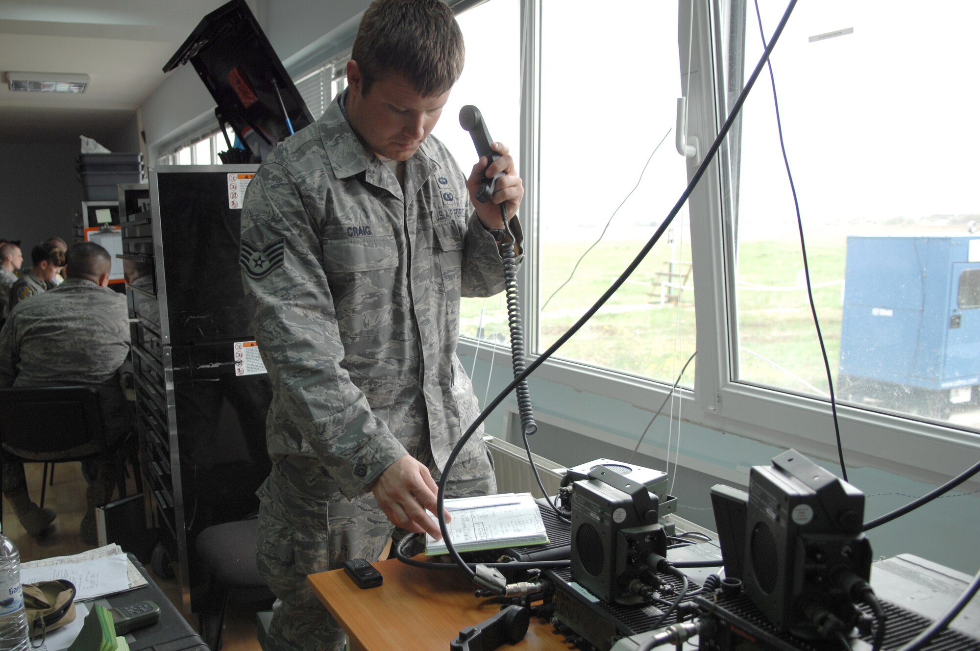 BEZMER AIR BASE, Bulgaria – Staff Sgt. Brandon Craig, a Tactical Air Control Party radio operator, runs a training scenario for pilots operating out of Bezmer Air Base.  Sergeant Craig deployed from the 2nd Air Support Operations Squadron out of Vilseck, Germany, to Bulgaria to support a joint training exercise. (U.S. Air Force photo by Master Sgt. Bill Gomez) 