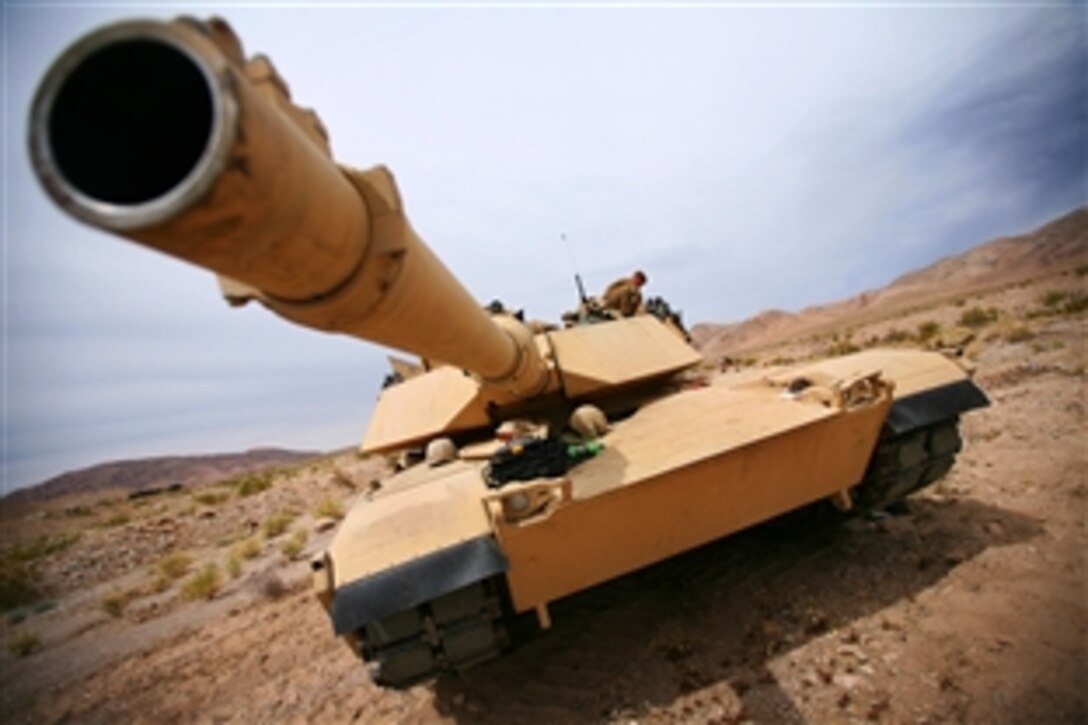 U.S. Marines participated in a five-day, live-fire annual training exercise at Noble Pass, Marine Corps Air Ground Combat Center Twentynine Palms, April 14, 2009. The graded exercise tested each platoon’s ability to maneuver and maintain formations while engaging targets. The Marines are assigned to Charlie Company, 1st Tank Battalion.