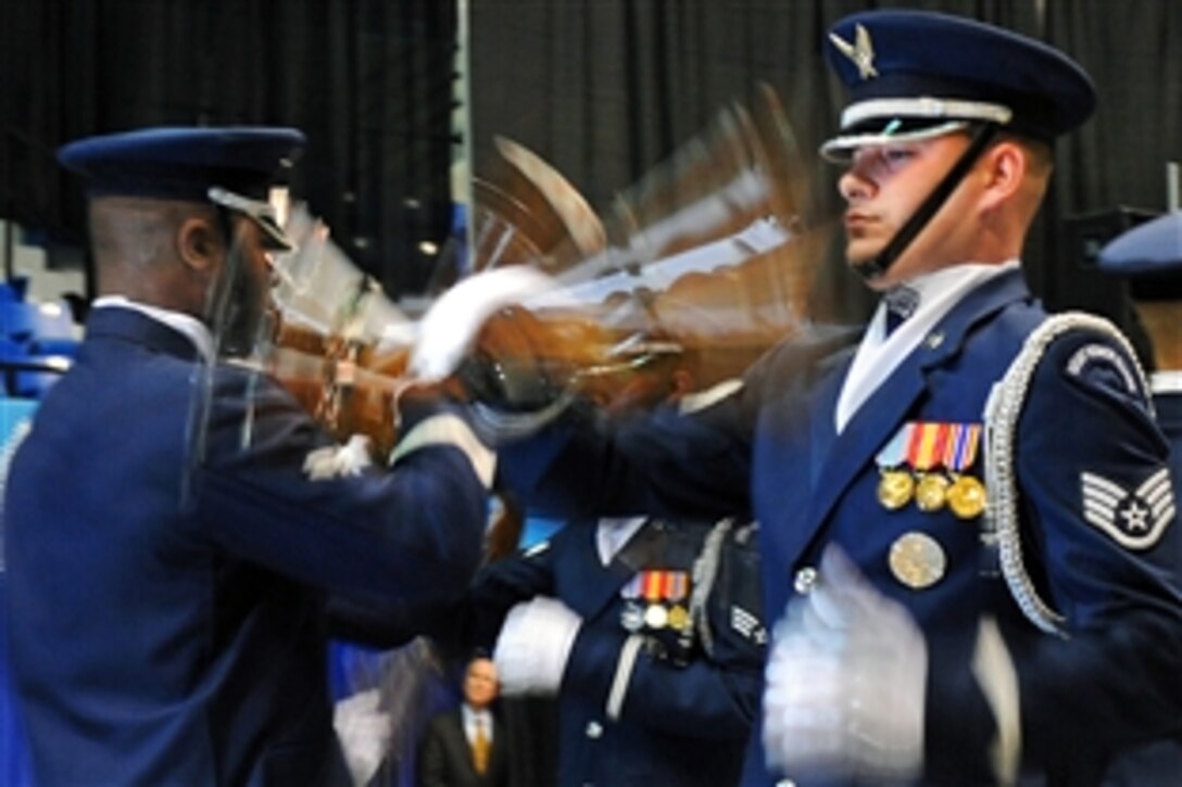 U.S. Air Force Honor Guard members perform during the opening ceremony of Hampton Roads Air Force Week at Hampton University, Va., April 18, 2009. The ceremony kicks off a week of activities to give the community an opportunity to meet Air Force members, see how they help protect America and thank them for their support.