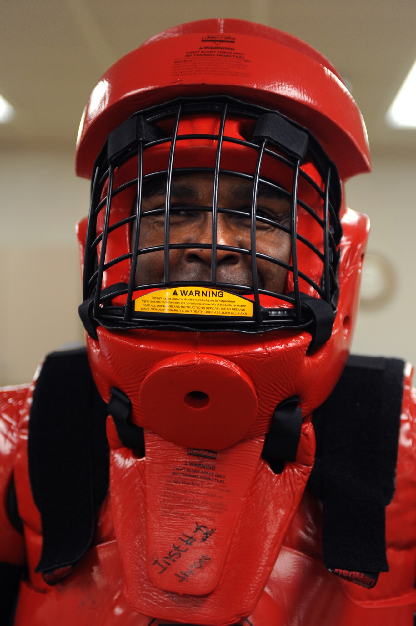 University of Las Vegas (UNLV) Police, Officer Darrell Johnson, acts a street villain for the students attending the Rape Aggression Defense (RAD) class, April 17, Nellis Air Force Base, Nev. UNLV Police, Sexual Assault Response Coordinators (SARC) and security forces personnel team up to provide Nellis Airmen with the most realistic self defense scenarios to help improve survivability during and after an attack.
(U.S. Air Force photo by/Senior Airman Nadine Y. Barclay/RELEASED))