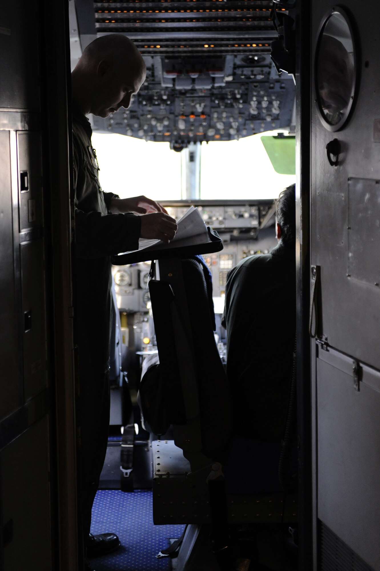 Capt. Jason Herring, 6th Air Refueling Squadron, Travis Air Force Base, Cali., reviews mission plans prior to take off during RED FLAG-Alaska 09-2 April 22, 2009, Eielson Air Force Base, Alaska. The Tanker Task Force supports all aerial refueling missions during RF-A a Pacific Air Forces premier air combat exercise.  (U.S. Air Force Photo/Senior Airman Jonathan Snyder)