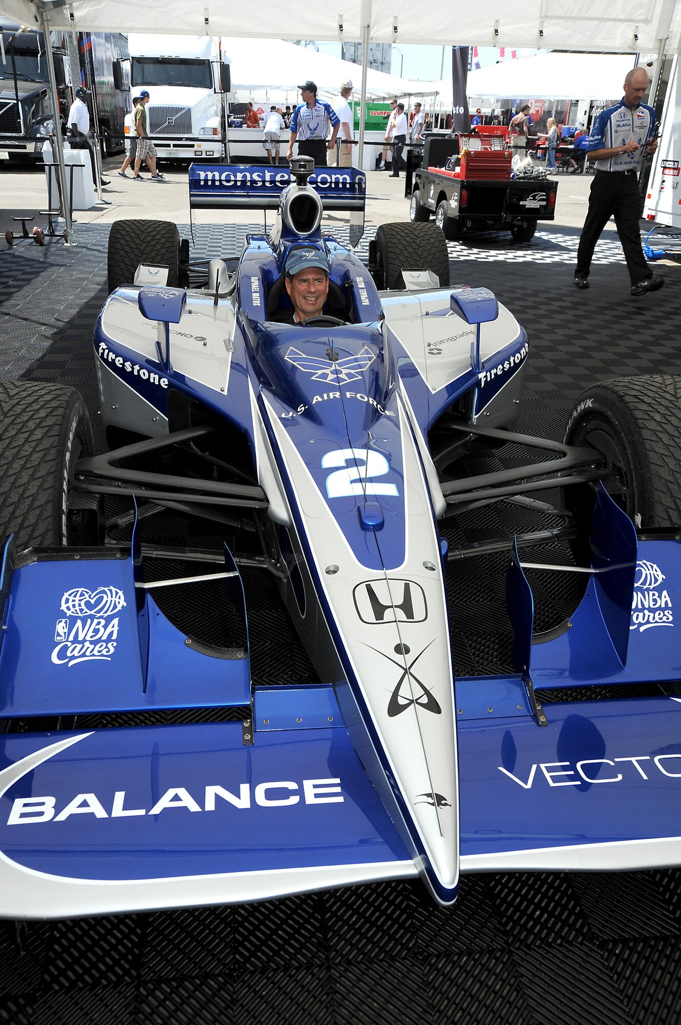 Space and Missile Systems Center Commander Lt. Gen. Tom Sheridan sits behind the wheel of Luczo Dragon Racing No. 2 car at the Long Beach Grand Prix, April 19. Driven by Raphael Matos, the Indy car will be sporting the Air Force logo during several races this season. (Photo by Joe Juarez)
