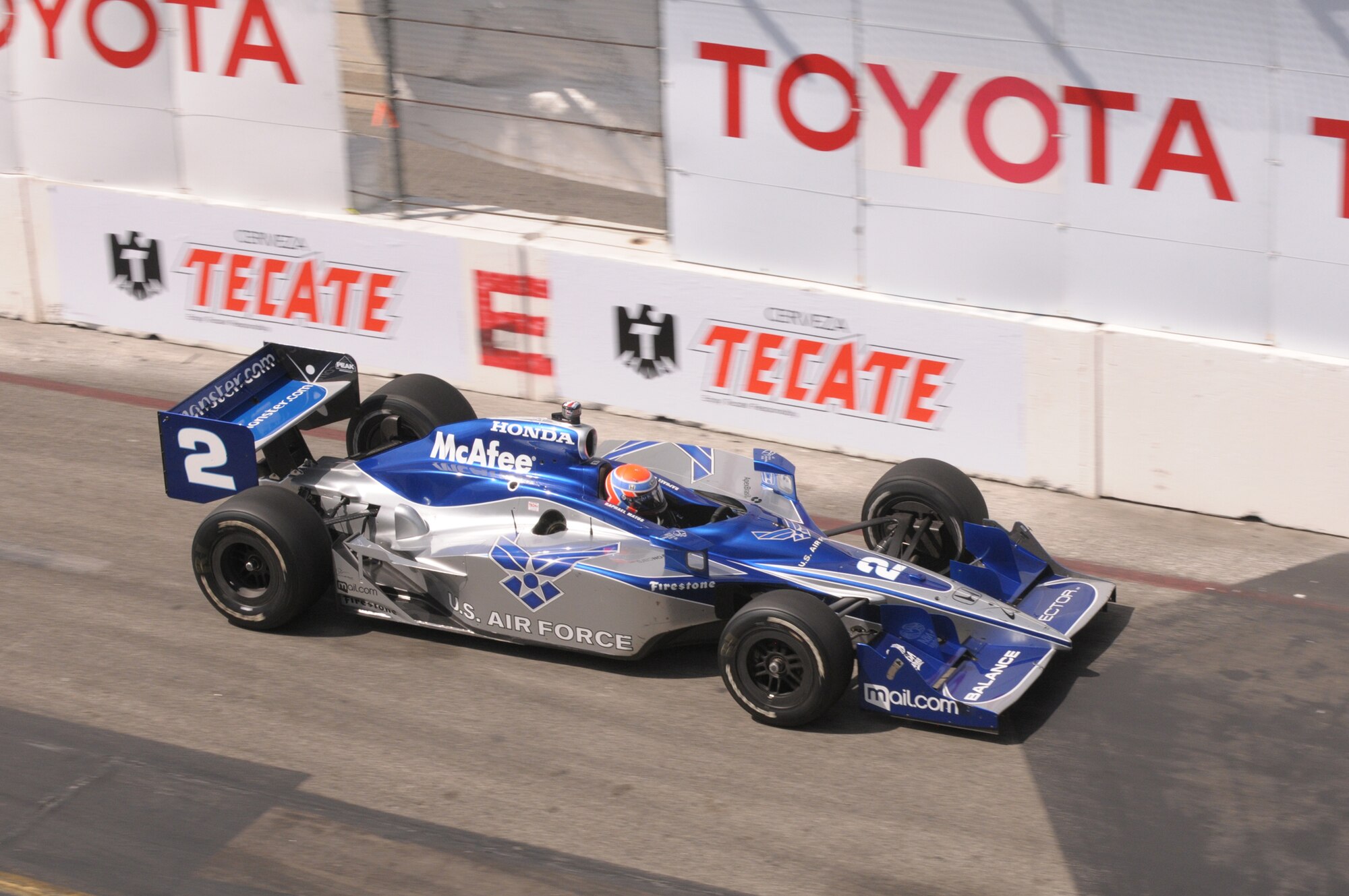 Indy Car Driver Raphael Matos speeds around the track during the Long Beach Grand Prix, April 19.  Luczo Dragon Racing No. 2 car will be sporting the Air Force logo during several Indy car races this season including the Indy 500. Matos was at Los Angeles Air Force Base on April 15 to sign autographs. (Photo by Joe Juarez)