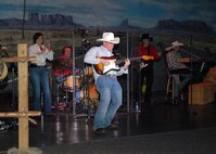 The Air Force Band of the West performs during Fiesta In Blue 2009 at Trinity University's Laurie Auditorium April 21. The band's Jazz Ensemble, Dimensions In Blue, and Popular Music Group, Top Flight, entertained the crowd with music inspired by the state of Texas. (U.S. Air Force photo/Alan Boedeker)