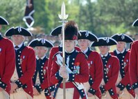 The Old Guard Fife and Drum Corps marches during the Fort Sam Houston FiestaCeremony and Fireworks Extravaganza April 19. The event featured food and drink booths, live entertainment, carnival, games, military equipment display and novelty items. Many military organizations participated in the event, including the Lackland Honor Guard. (U.S. Air Force photo/Alan Boedeker)                             