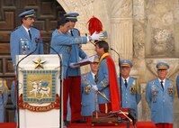 King Antonio LXXXVII receives his public investiture by Fiesta officials in front of the Alamo April 18. The investiture is one of the longest-standing Fiesta traditions; King Antonio is selected each year from the ranks of the Texas Cavaliers, a patriotic and civic organization. During his reign, King Antonio visits schools throughout the city, hospitals, nursing homes, businesses and military bases. (U.S. Air Force photo/Alan Boedeker)                            