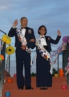 Tech. Sgt. Raymond Rodriguez and Senior Airman Maribelle Hernandez, 2009 Lackland Ambassadors, wave to the crowd at the Air Education and Training Command Fiesta kick off party April 15 at Randolph's Officers Club. The ambassador's represented Lackland at more than 50 Fiesta events. (U.S. Air Force photo/Alan Boedeker)                                   