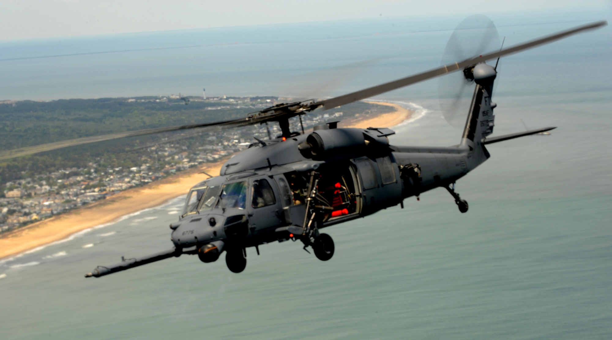 LANGLEY AIR FORCE BASE, Va. -- The 41st Rescue Squadron HH-60G Pave Hawk helicoptor, Moody Air Force Base, Ga., perform during the Joint Air Power Demonstration at the Virginia Beach boardwalk April 22. The demonstration showcased the critical role air power plays in the joint fight. This is one of many events going on in the Hampton Roads area as Air Force member say "thank you" to the community during Hampton Roads Air Force Week. (U.S. Air Force/Senior Airman Scott Aldridge)