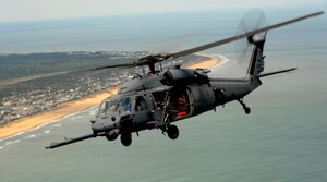 LANGLEY AIR FORCE BASE, Va. -- The 41st Rescue Squadron HH-60G Pave Hawk helicoptor, Moody Air Force Base, Ga., perform during the Joint Air Power Demonstration at the Virginia Beach boardwalk April 22. The demonstration showcased the critical role air power plays in the joint fight. This is one of many events going on in the Hampton Roads area as Air Force member say "thank you" to the community during Hampton Roads Air Force Week. (U.S. Air Force/Senior Airman Scott Aldridge)