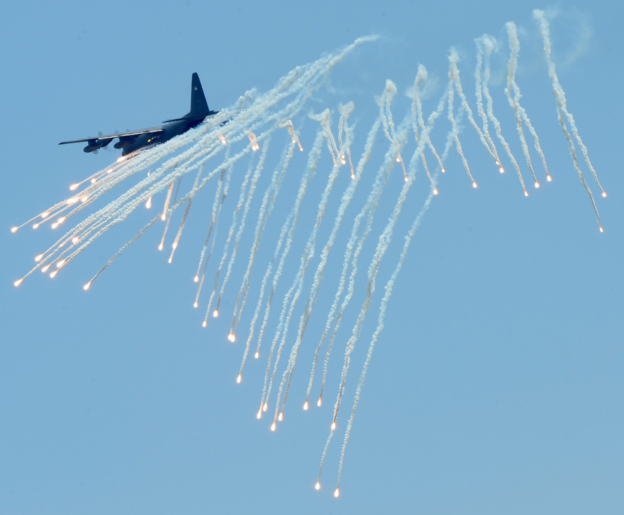 LANGLEY AIR FORCE BASE, Va. -- The 71st Rescue Squadron HC-130, Moody Air Force Base, Ga., releases flares during the Joint Air Power Demonstration at the Virginia Beach boardwalk April 22.  This is the first time there has been a joint service air power demonstration in Virginia Beach.  (U.S. Air Force photo/Airman 1st Class Zachary Wolf)

