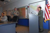 MINOT AIR FORCE BASE, N.D. -- Col. Parker Northrup (right) gives a briefing during exercise planning at the base command post here April 22. (U.S. Air Force photo by Senior Airman Wesley Wright)
