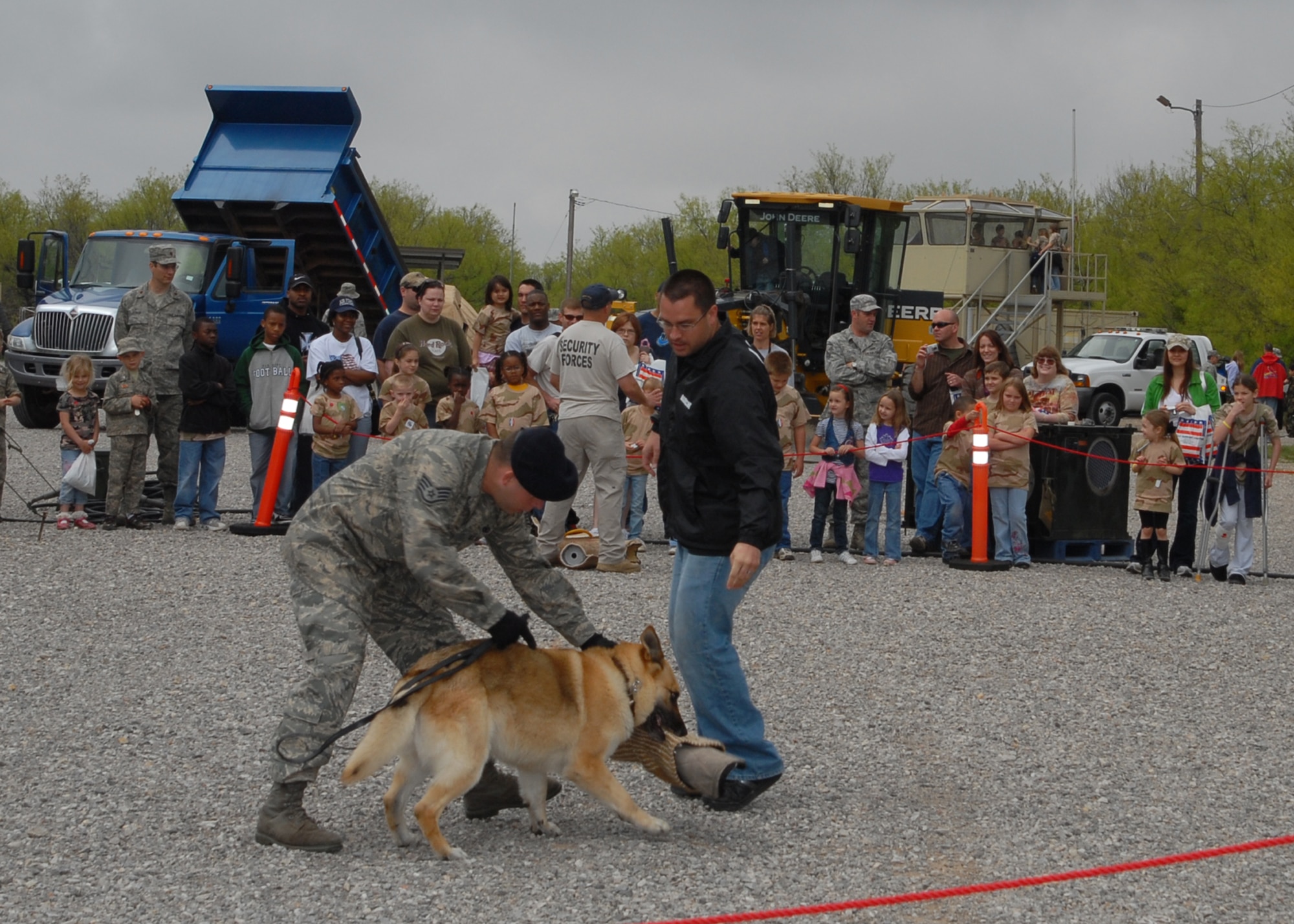 The 82nd Security Forces Squadron military dog handlers put on a demonstration for the Operation KIDS deployers April 18 at the Medical Readiness Site.