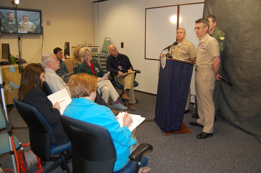 During this year’s Joint Land, Aerospace and Sea Simulation game, Air Force Reserve and Air National Guard members posed as media for JLASS students. The purpose of the media presence is to prepare students in dealing with media members during real-world situations. The reporters seated are: DeAnn Barr, Kim Tebrugge, Charlie Heit, Hien Vu, Mavi Smith, Carol Schmidt and Jay Delancy. The interview was with Pacific Command members Navy Cmdr. Adrian Garcia, Navy Lt. Cmdr. Fred Stratton and Air Force Col. Dan Kosin (behind). (U.S. Air Force photo by Carl Bergquist)