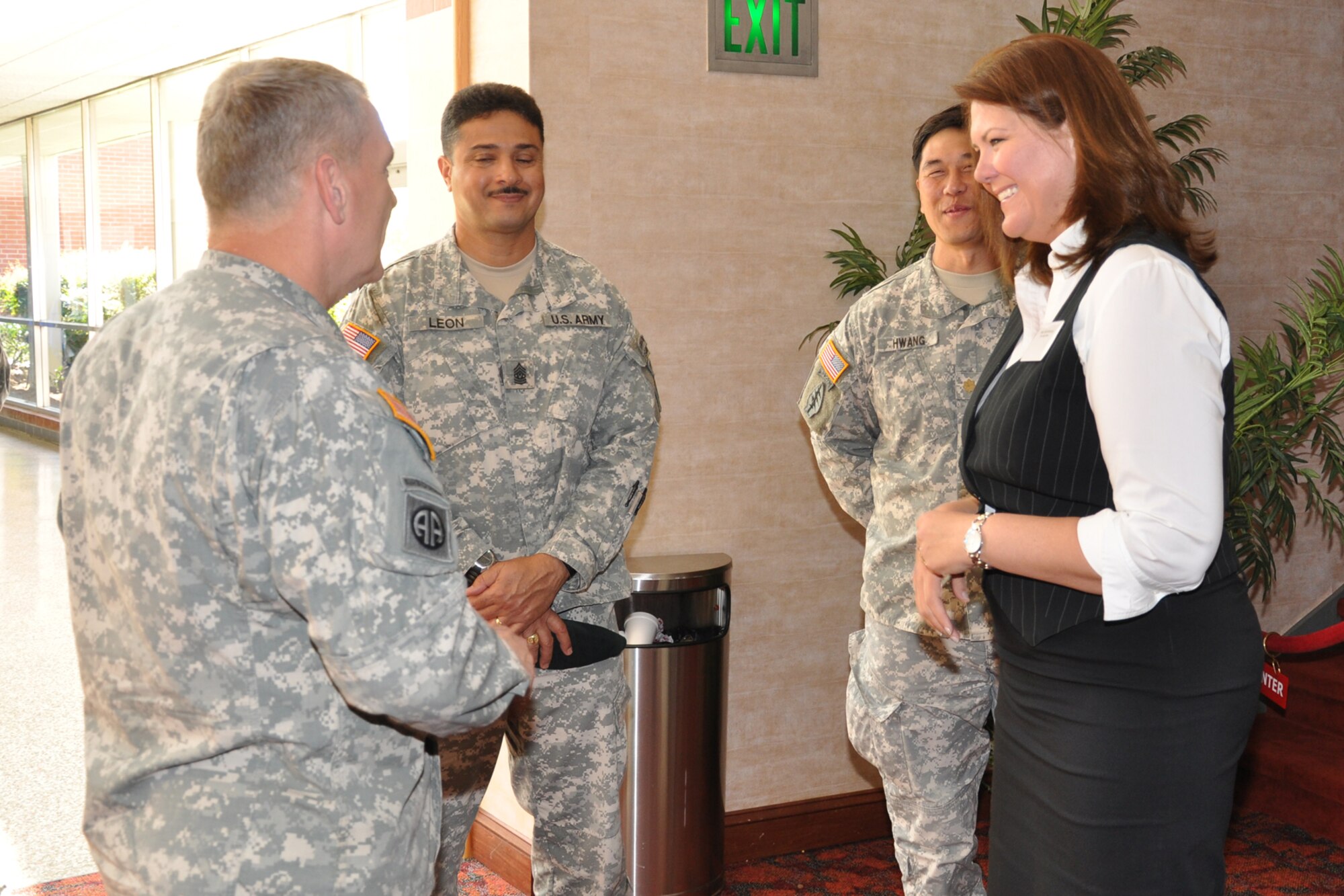 FORT BRAGG, North Carolina -- Lori Burgess, SEEK Eagle office and spouse of an Army First Sergeant assigned to the Navy EOD school, talks to Soldiers about their upcoming move of the 7th Special Force Group to Eglin.  More than 30 representatives from Eglin traveled to Fort Bragg, April 16-18, to present 7th SFG(A) members and spouses with information about the base and Northwest Florida.  More than 1,000 people attended the briefings. (Photo by Master Sgt. Andrew Leonhard)