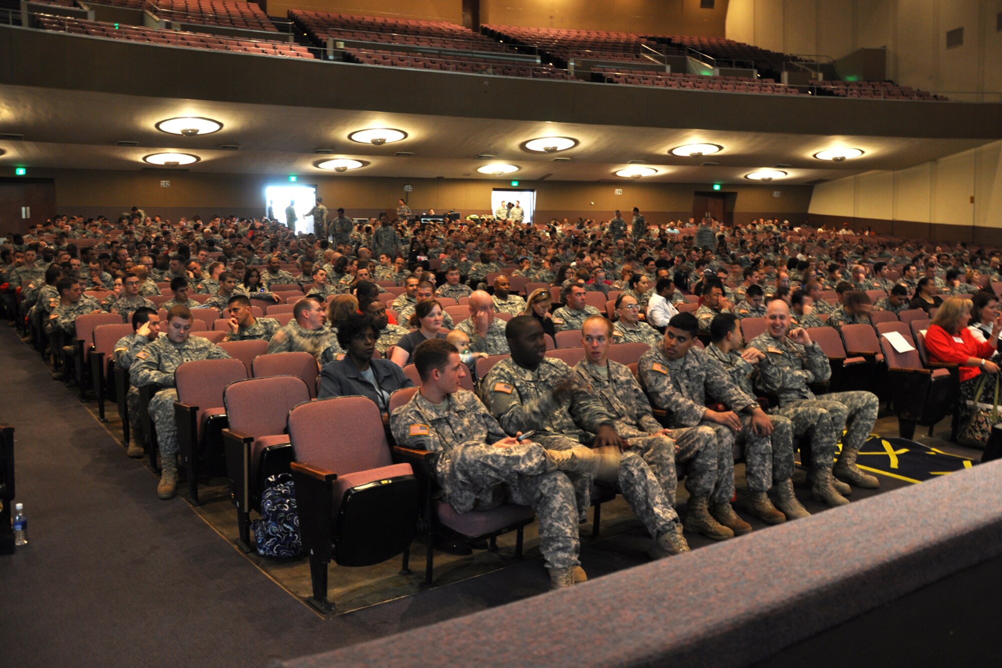 FORT BRAGG, North Carolina -- Soldiers and their spouses listen to briefings about Eglin and the surrounding communities April 17th.  More than 30 representatives from Eglin traveled to Fort Bragg, April 16-18, to present 7th Special Forces Group (Airborne) members and spouses with information due to the Group's upcoming move to the Panhandle.  More than 1,000 Soldiers and spouses attended the briefings. (Photo by Master Sgt. Andrew Leonhard)