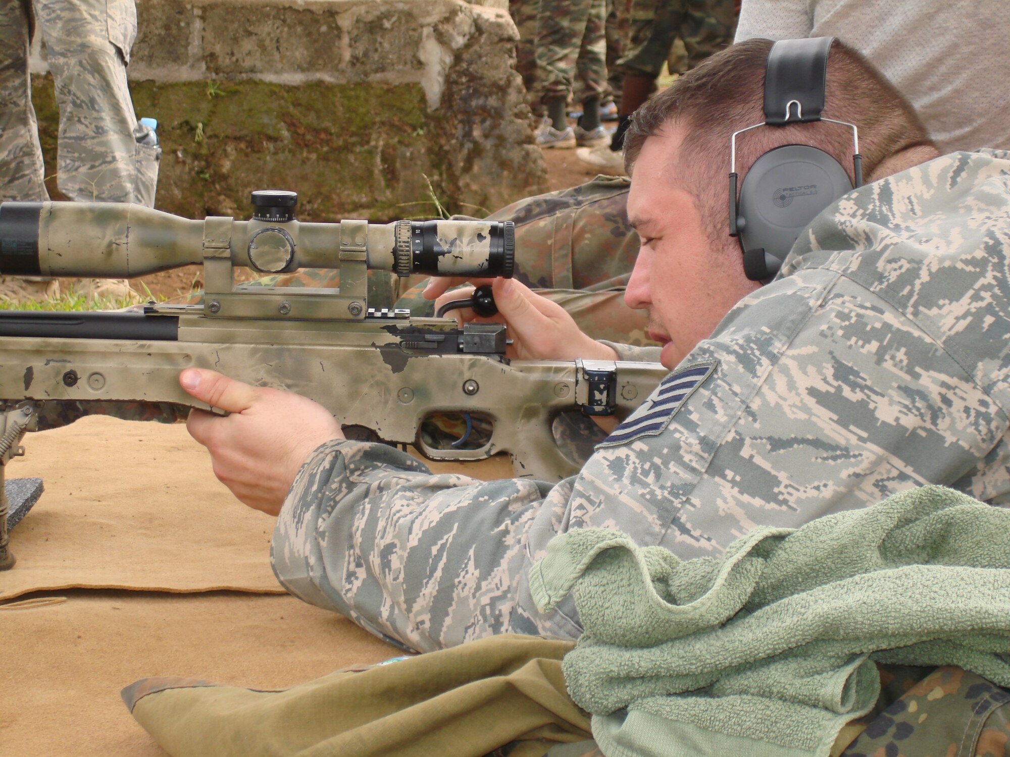 Tech. Sgt. Thomas Dantin, 15th Air Mobility Operations Squadron, fires a German sniper rifle during the Joint Maritime Security Training. The joint trainings, sponsored by U.S. Navy SEALS, primary mission is to train local African military counterparts to enhance regional and maritime safety and security. Sergeant Dantin, along with Airmen from 21st AMOS from McGuire Air Force Base, N.J., are currently deployed to Africa in support of Africa Partnership Station 2009, to provide 24/7 communication operations in the deployed location. (U.S. Air Force Photo by Staff Sgt  Francis Lalic