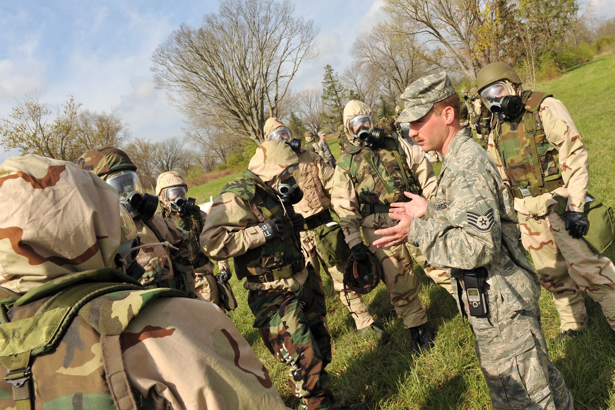 SCOTT AIR FORCE BASE, Ill. --Staff Sgt. Aaron Burnley, 375th Civil Engineer Emergency Management flight, speaks to a group of 375th Airlift Wing personnel during an Ability to Survive and Operate field training April 16. The ATSO event was one of four activities 375th AW personnel took part in for Warrior Day.(U.S. Air Force photo/Senior Airman Megan Gilliland) 