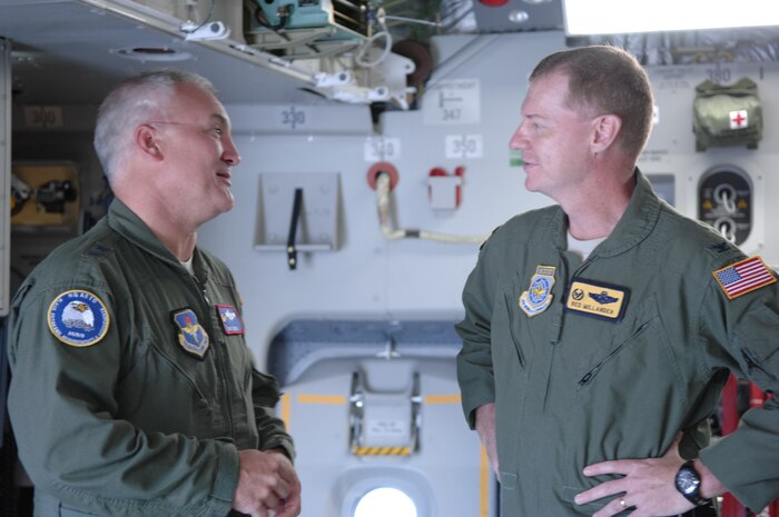 Maj. Gen. Erwin F. "Erv" Lessel III speaks with Col. John "Red" Millander during the delivery of Charleston's newest C-17 Apr. 17. This is the seventh out of ten new C-17s Charleston AFB will receive.  General Lessel  is the Director of Plans, Programs, Requirements and Assessments, and the Director of the San Antonio Joint Program Office, Headquarters Air Education and Training Command, Randolph AFB, Texas. Colonel Millander is the 437th Airlift Wing commander. (U.S. Air Force photo/Senior Airman Katie Gieratz)