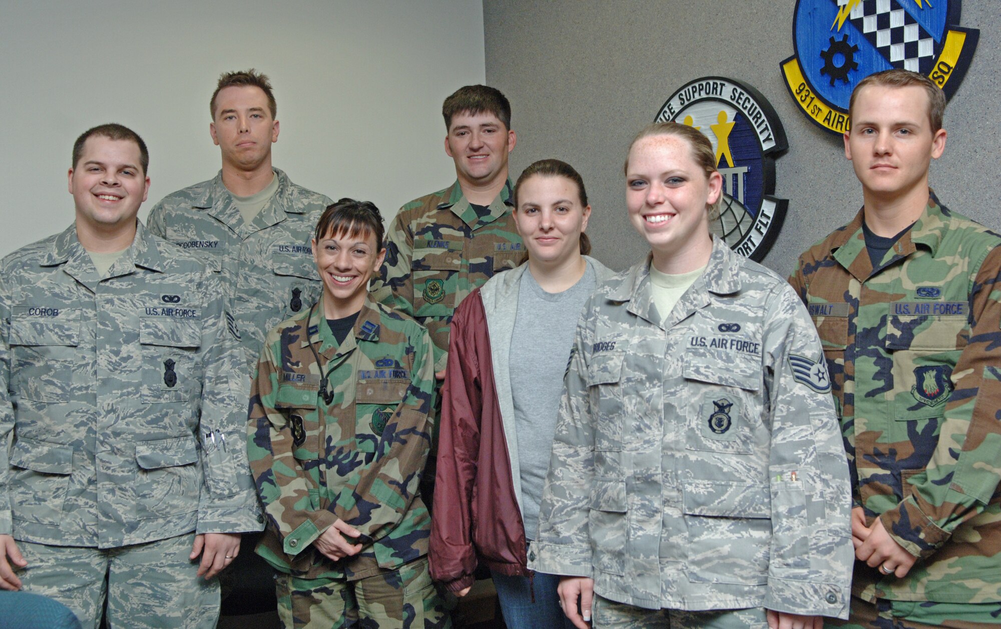 The 931st Air Refueling Group welcomed the following Airmen during its unit training assembly in April: (from left to right) Staff Sgt. David Corob, Tech. Sgt. Gregory Podobensky, Capt. Christina Miller, Senior Airman Nicholas Klenke, Senior Airman Andrea Foster-Pincoski, Staff Sgt. Dawn Bridges, and Staff Sgt. Marshall Oswalt. (U.S. Air Force photo/Senior Airman Connor Burkhard)