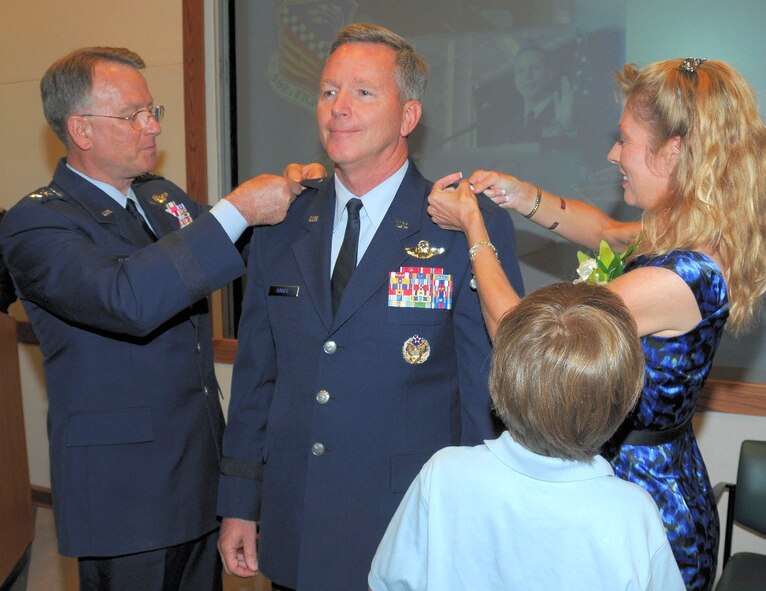 HOMESTEAD AIR RESERVE BASE, Fla. – Brig. Gen. William B. Binger, 482nd Fighter Wing commander, receives his stars during a ceremony at the Heritage Hall Conference Center on April 18. Retired Lt. Gen. John Bradley, former Chief of the Air Force Reserve Command, and General Binger’s wife Mo and their son Jake participated in pinning on the brigadier general stars. Wing members, elected officials and community leaders filled the conference center to take part in the significant milestone. (U.S. Air Force photo/Tim Norton)