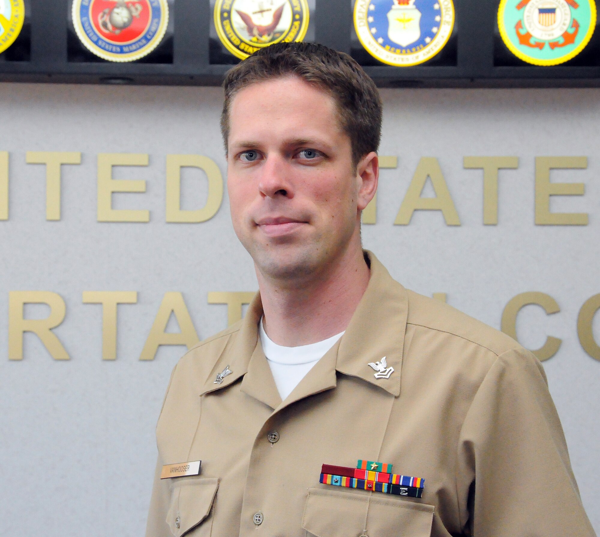 SCOTT AIR FORCE BASE, Ill. --Petty Officer 2nd Class Joseph Vanhooser who works at U.S. Transportation Command J1-PN manning personnel, pay and Navy element administration. (U.S. Air Force photo/Tech. Sgt. Michelle Larche) 