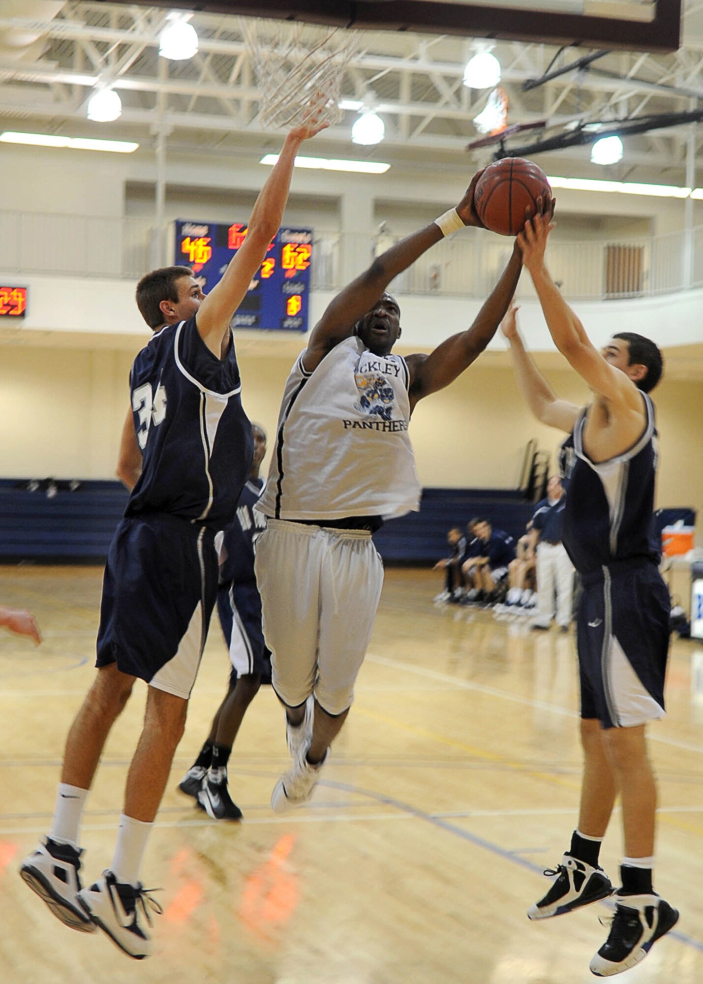 BUCKLEY AIR FORCE BASE, Colo. -- James Lewis of the 460th Comptroller Squadron, soars toward the hoop against the Air Force Academy prep team here Jan. 28.  Lewis is currently at Warner-Robins AFB, Ga., preparing for the All Services Tournament in Millington, Tenn., May 10-18. (U.S. Air Force photo by Senior Airman Christopher Bush)