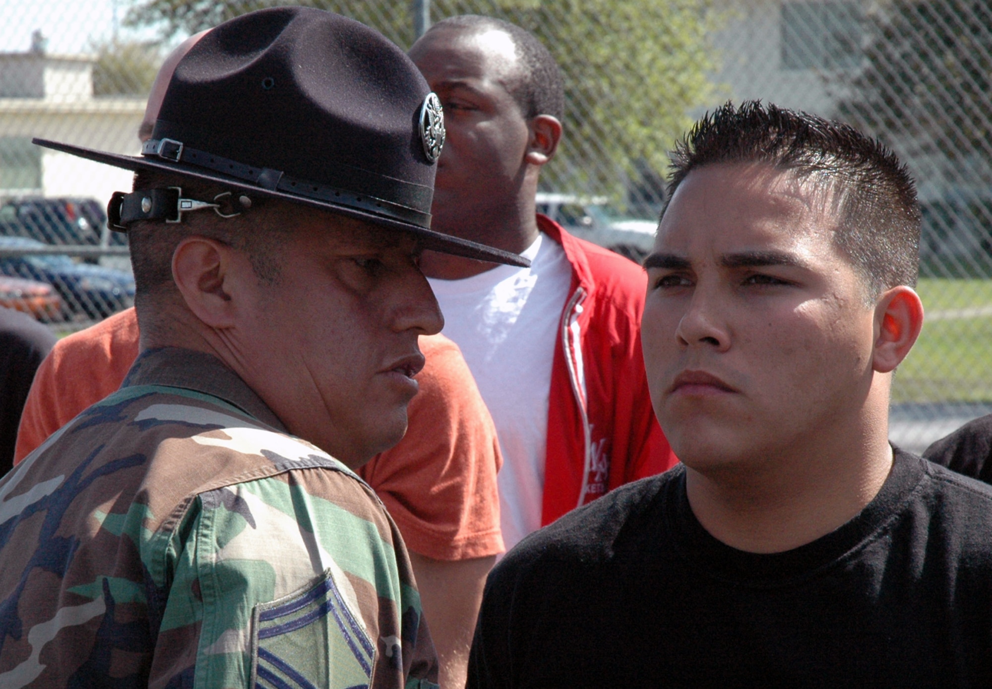 Senior Master Sgt. Steve Betancourt, 96th Medical Squadron, Eglin Air Force Base, directs Joshua Santos, a recruit in the delayed entry program at Duke Field, on paying close attention to following instructions while maintaining military bearing and discipline.  Sergeant Betancourt, a former military training instructor of four years, volunteered during the April unit training assembly to give DEP recruits a taste of what they will experience upon arriving at basic military training, Lackland Air Force Base, Texas. The DEP maintains contact with recruits awaiting their ship date to BMT while ensuring they are in compliance with the Air Force Reserve standards. It also gives recruits the information and motivation to have a smoother transition from civilian to military life. (U.S. Air Force photo /Senior Airman Jon McCallum)