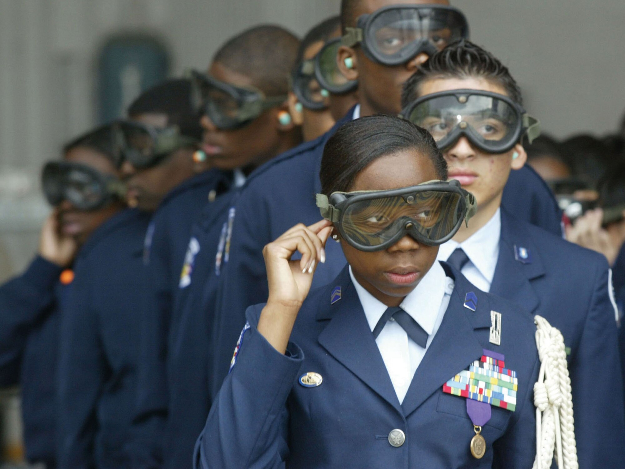 Air Force Junior ROTC cadets from an Atlanta high school prepare to board a 94th Airlift Wing C-130 transport aircraft April 14, 2009. The cadets visited the Air Force Reserve Command unit at Dobbins Air Reserve Base, Ga., as a part of an orientation program to learn more about careers in the Air Force. (U.S. Air Force photo/Don Peek)