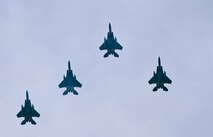 A 4-Ship Flyover of F-15's from the 125th Fighter Wing, Jackosnville, Fla. perform at the Cecil Field Airshow, April 19, 2009. (Air National Guard photo by Tech. Sgt. Shelley Gill)